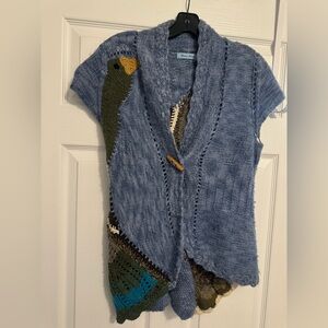 Wool swan sweater vest from Anthropologie